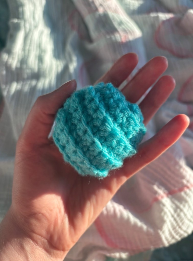 crocheted ball toy for a cat